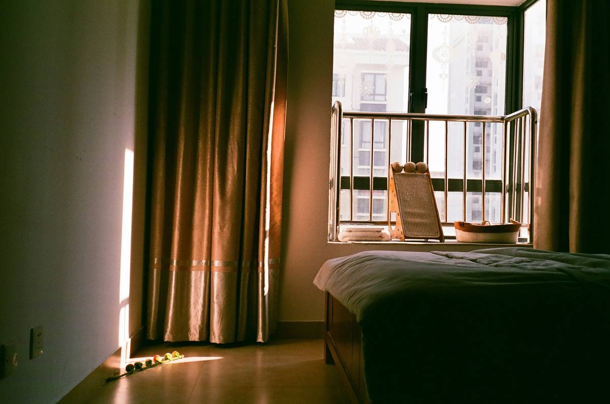 woman practicing morning sunlight exposure for tips for better sleep quality